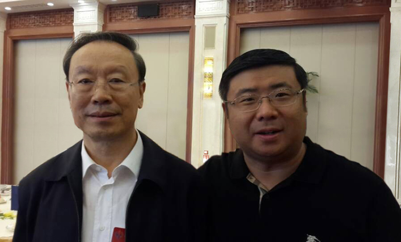 President Li Yong and the former member of secretariat of the CPC Central Committee,  the first vice chairman of the CPPCC Du Qinglin took the photo together.