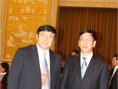 Chairman Li Yong took a photo with Cao Jianming, the former Vice Chairman of the Standing Committee of the National People’s Congress