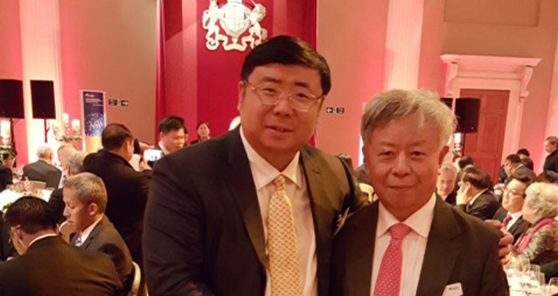 President Li Yong took the photo with Mr. Jin Liqun, the President-designate of Asian Infrastructure Investment Bank at the welcome dinner
