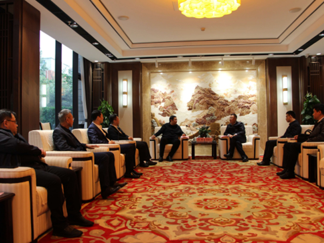Chairman Li Yong Met with Jiang Maosheng, Mayor of Shahekou District, Dalian, Who Was Invited to Visit, and His Party, and Conducted Work Discussions